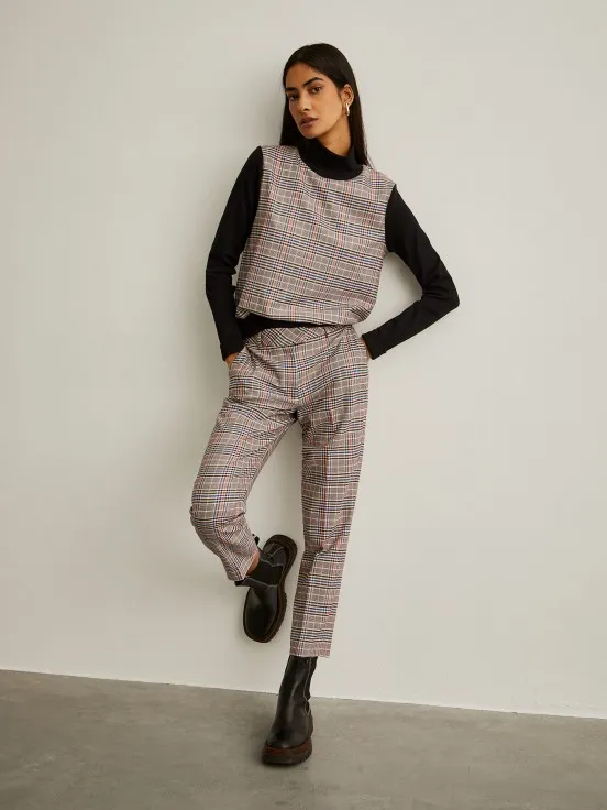 Turtleneck sweater with checkered pattern